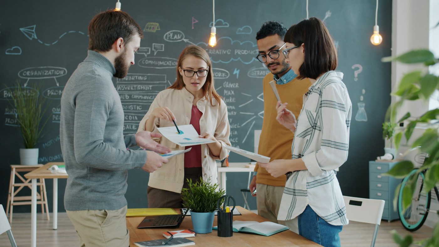 A CapGenX team collaborating together